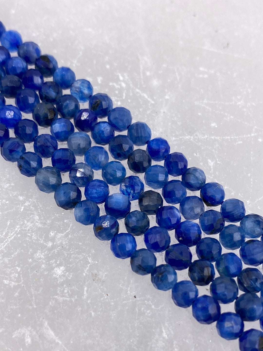 Crafting supplies such as faceted kyanite beads available at wholesale and retail prices, only at our crystal shop in San Diego!