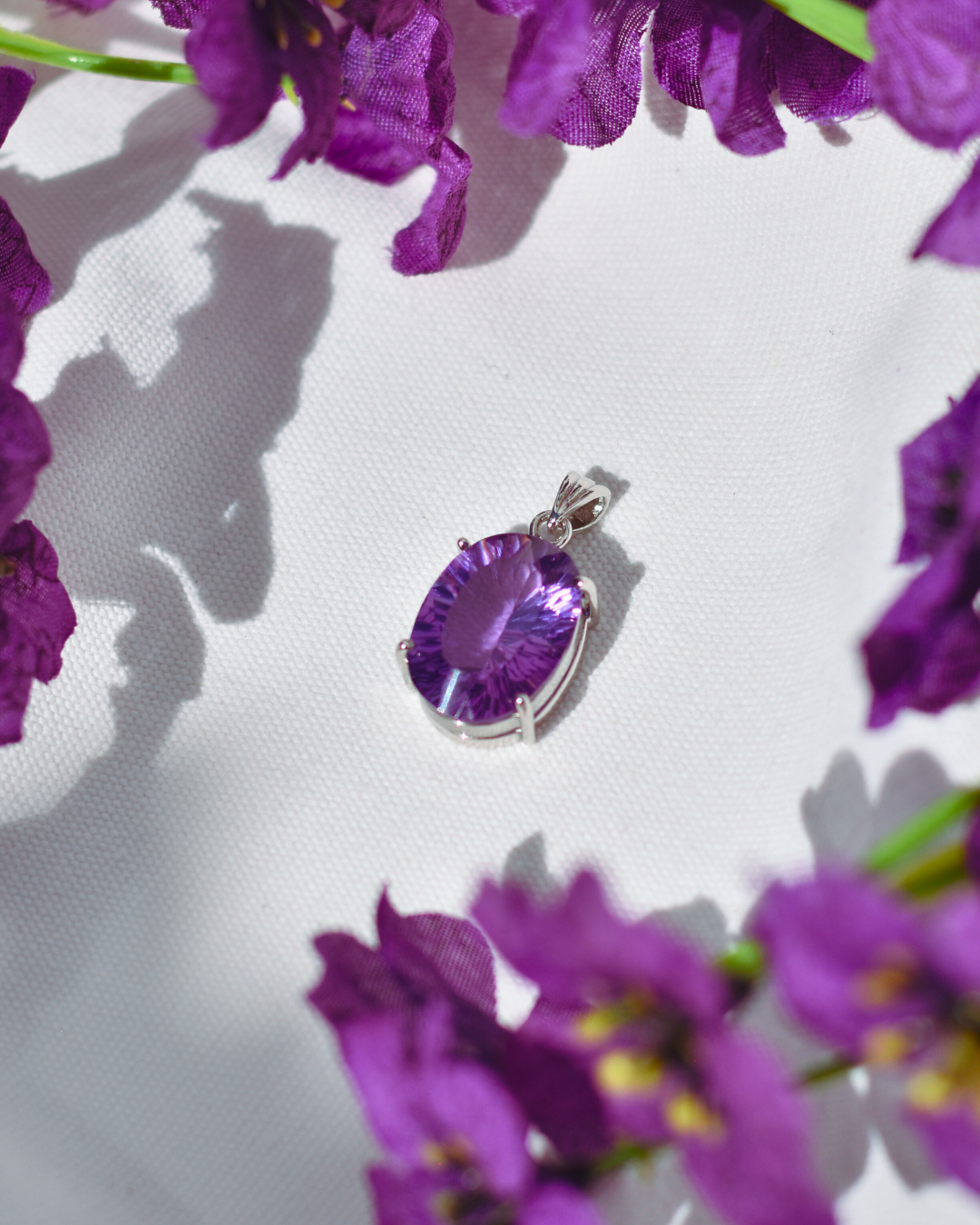 S.S. Faceted lab grown Amethyst Pendants