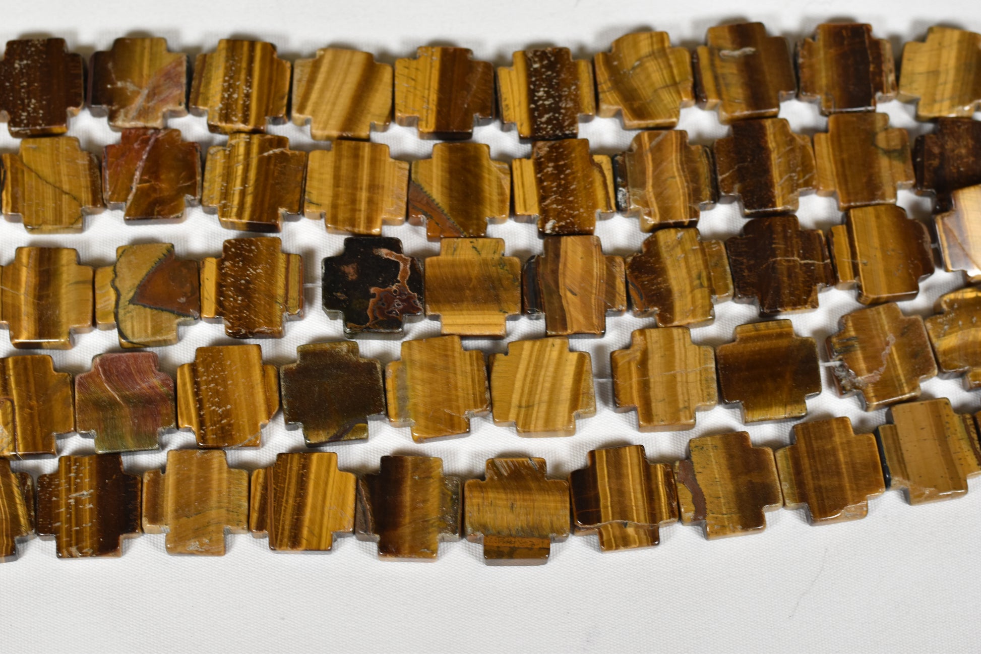 Crafting supplies such as Tiger Eye Beads available at wholesale and retail prices, only at our crystal shop in San Diego!