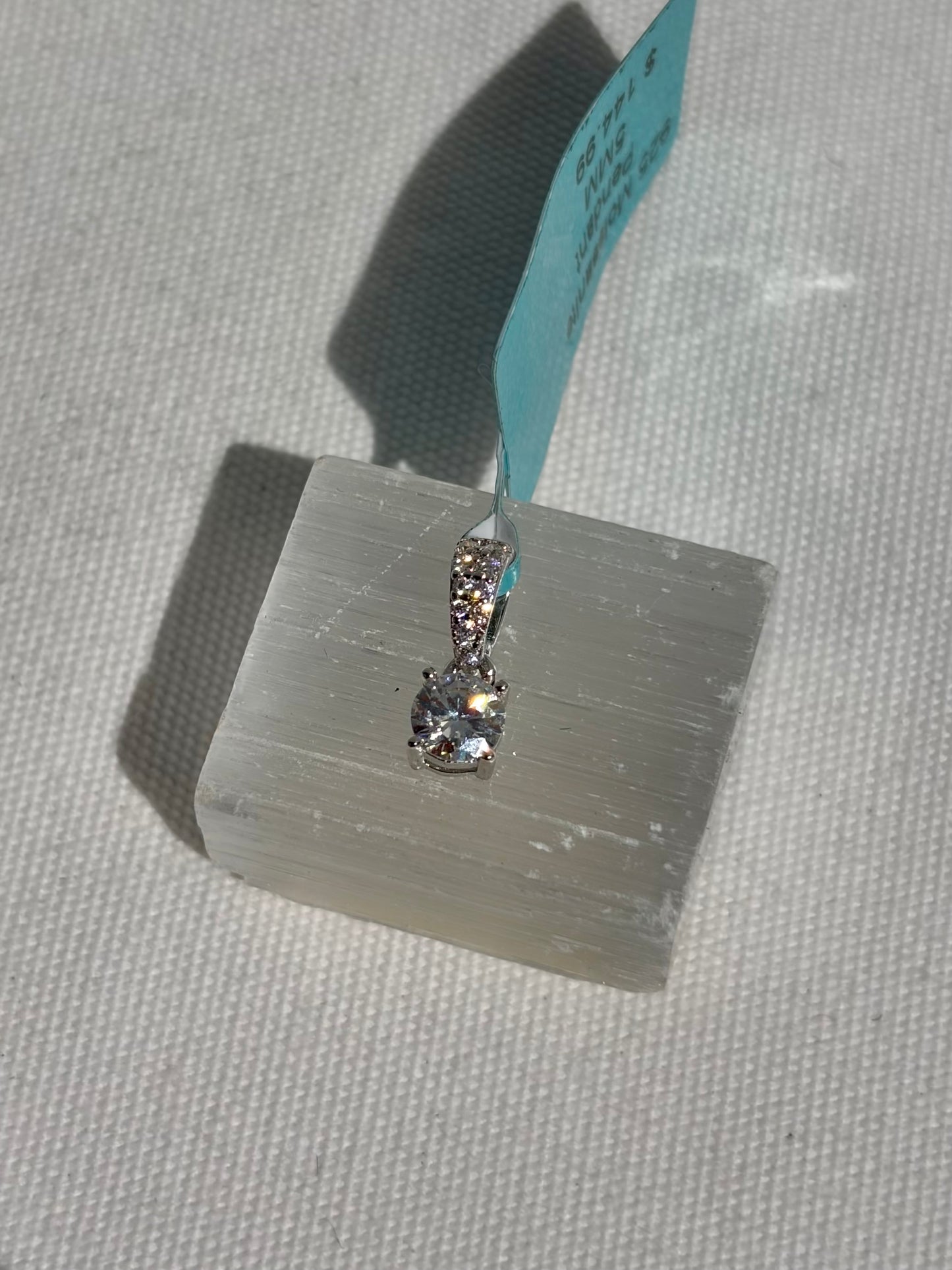 S.S. Moissanite Solitaire Pendants