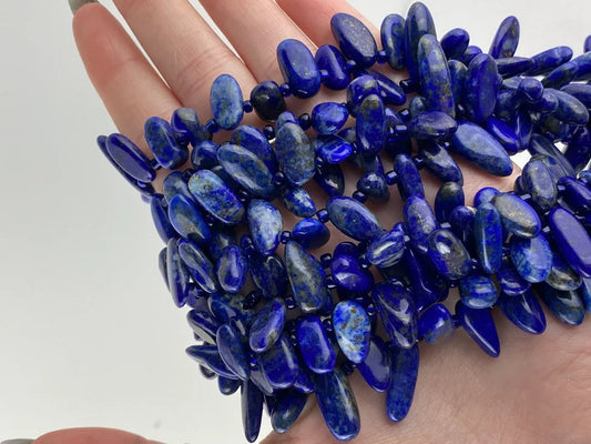 Crafting supplies such as lapis lazuli nugget beads available at wholesale and retail prices, only at our crystal shop in San Diego!