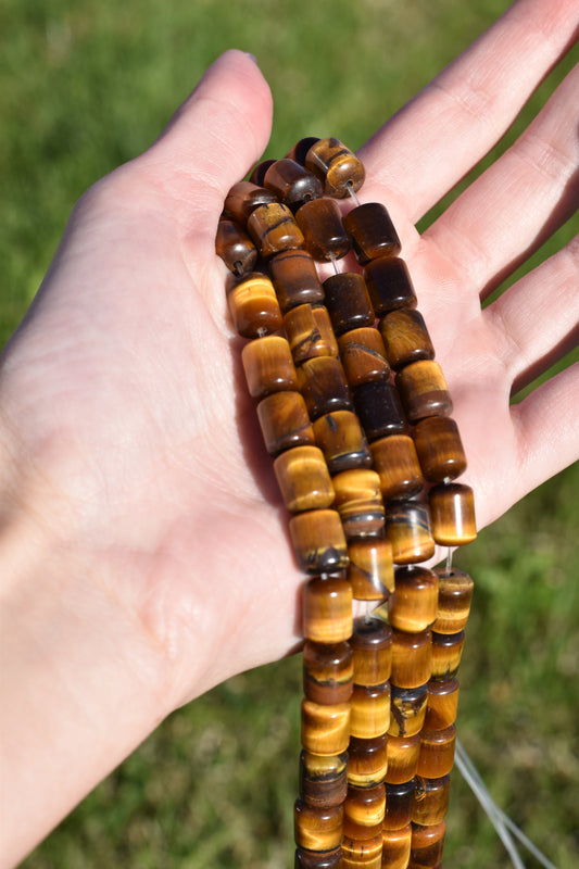 Crafting supplies such as tiger eye tube beads available at wholesale and retail prices, only at our crystal shop in San Diego.