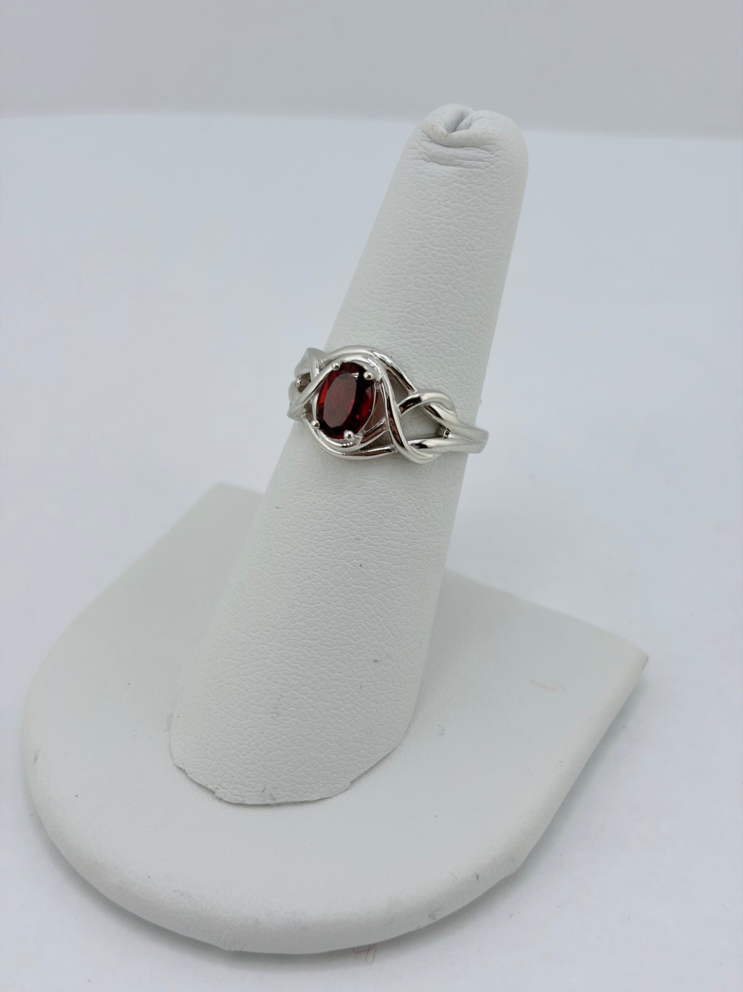 S.S. Faceted Garnet Twist Rings