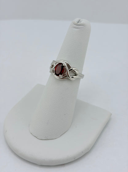 S.S. Faceted Garnet Twist Rings