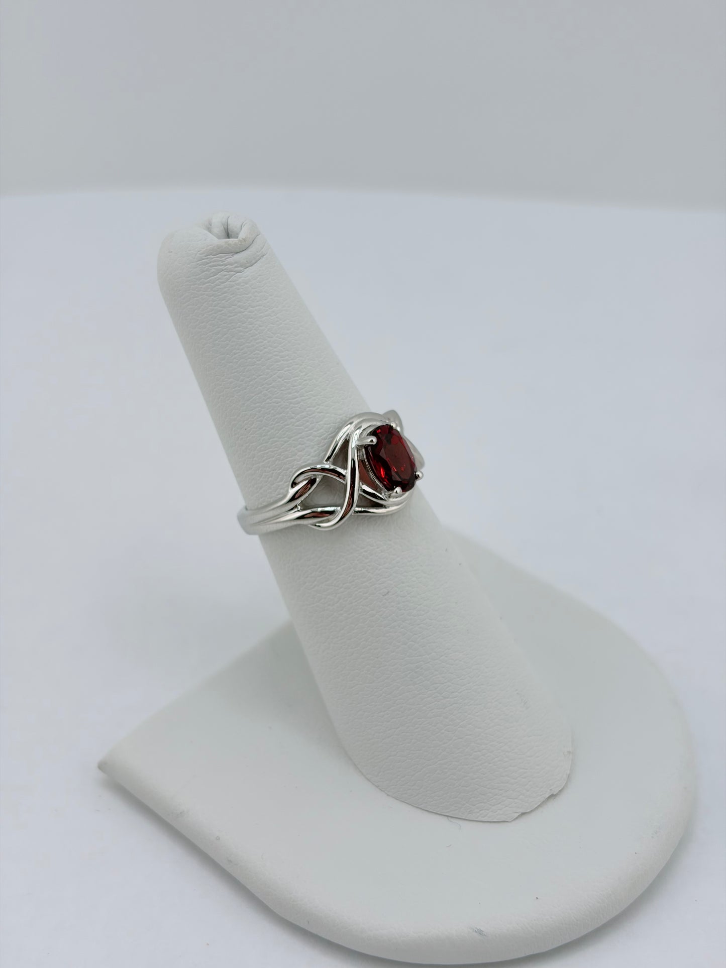 S.S. Faceted Garnet Twist Rings