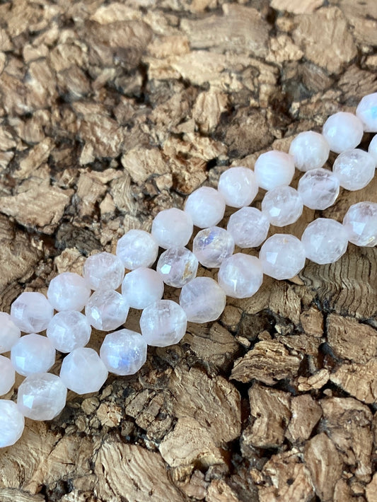 Crafting supplies such as faceted rainbow moonstone beads available at wholesale and retail prices, only at our crystal shop in San Diego!