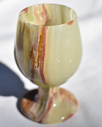 Check out our crystal shop in San Diego with green onyx decor such as lamps, bowls, candle holders and more!
At Pacific Beads, we carry stones in a wide variety of forms. Find green onyx geodes, green onyx housewares, green onyx carvings, and designer green onyx jewelry so that you can enjoy its healing properties in the way that best suits you and your lifestyle. The best part? You can shop crystals wholesale, meaning there is always something within your budget!