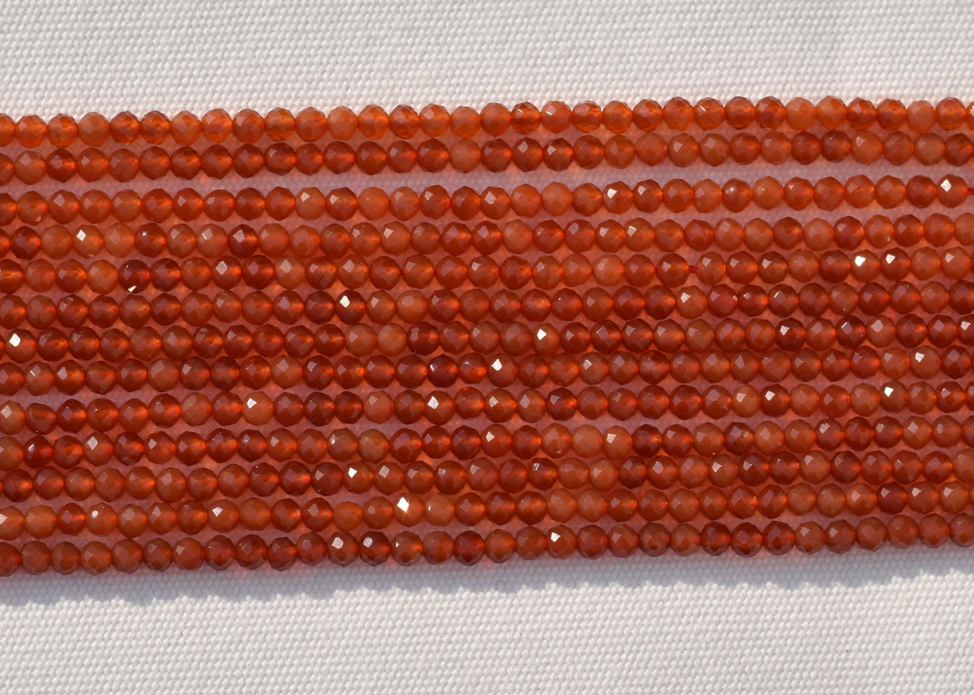 Crafting supplies such as Carnelian Beads available at wholesale and retail prices, only at our crystal shop in San Diego!