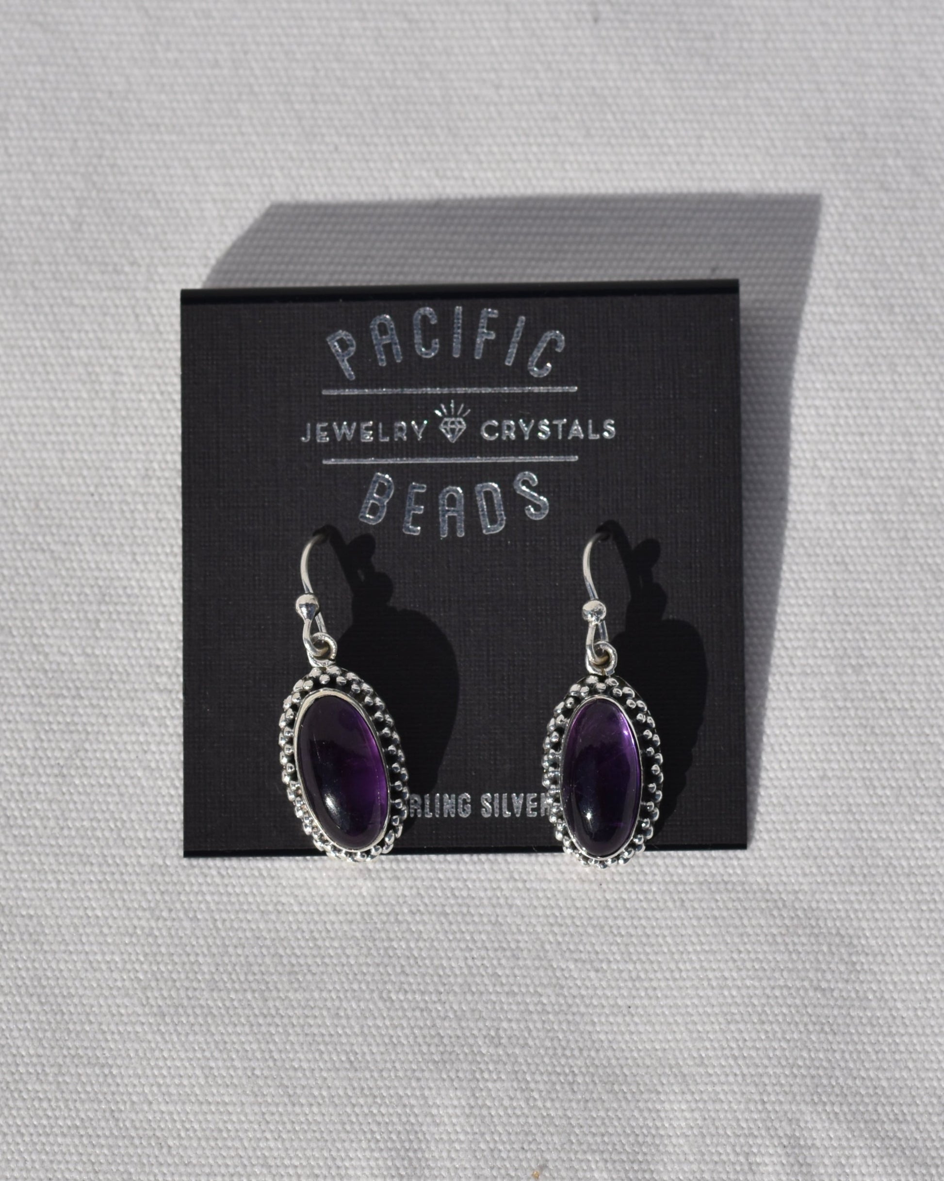 Sterling silver Amethyst Earrings available at wholesale and retail prices, only at our crystal shop in San Diego!