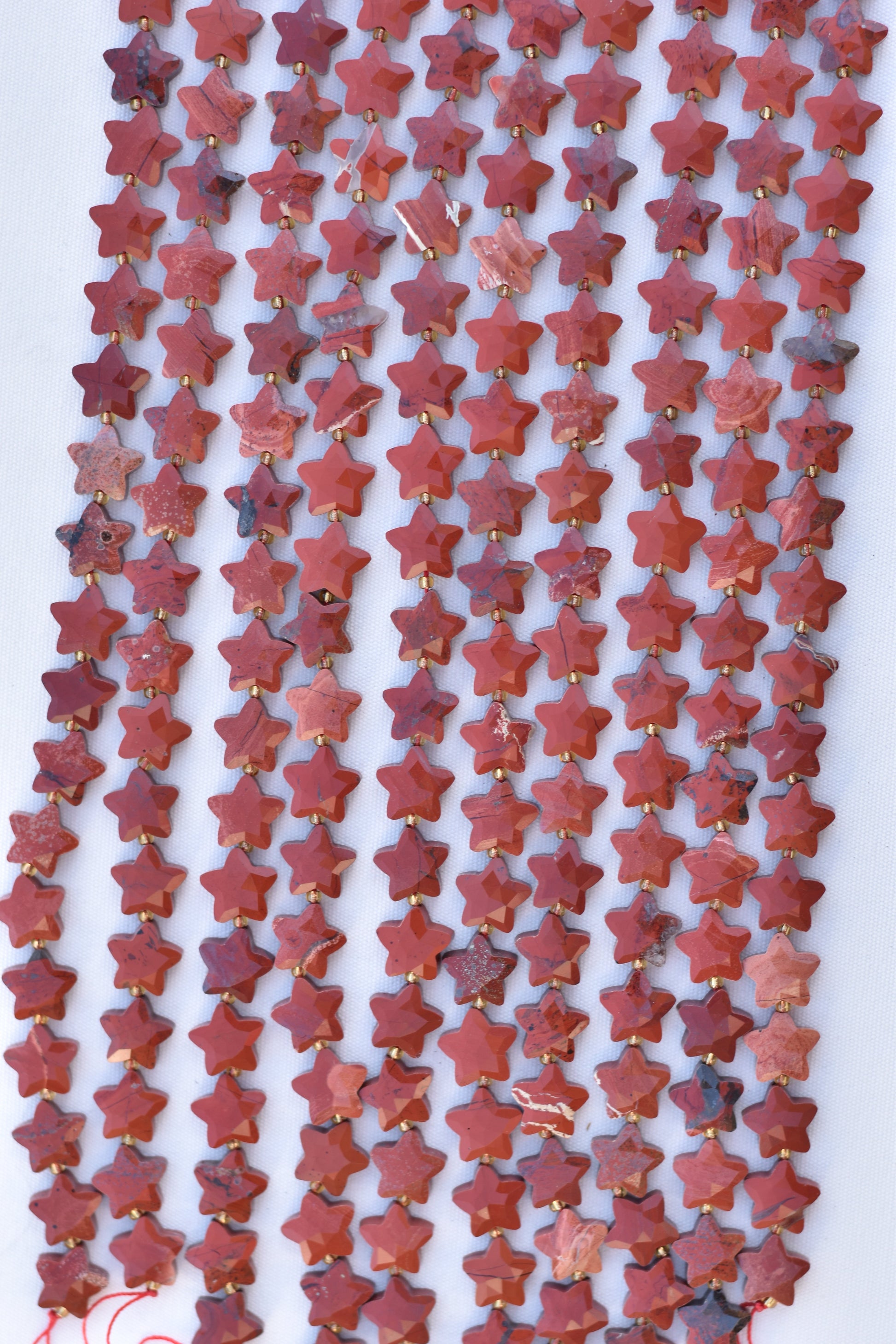 Check out our crystal shop in San Diego with red jasper beads and findings in sterling silver, gold, and more!
At Pacific Beads, we carry stones in a wide variety of forms. Find red jasper beads, red jasper carvings, and designer red jasper jewelry so that you can enjoy its healing properties in the way that best suits you and your lifestyle. The best part? You can shop crystals wholesale, meaning there is always something within your budget!