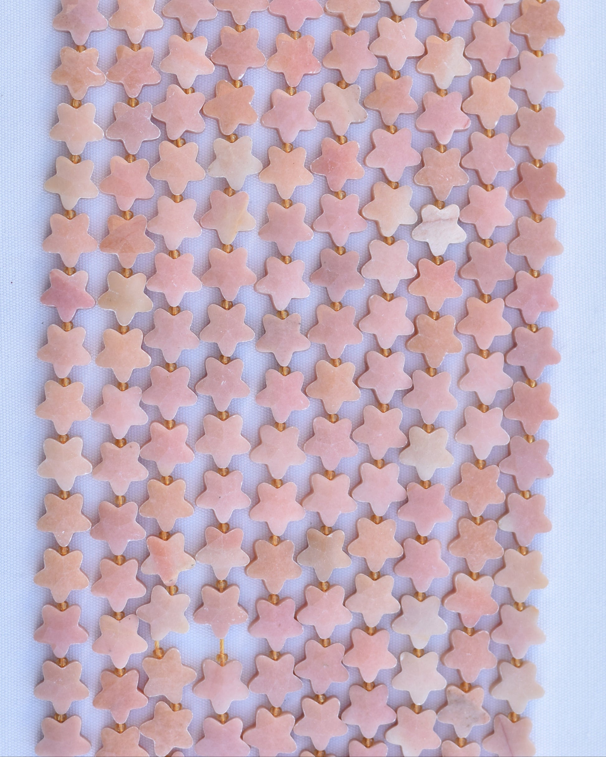 Check out our crystal shop in San Diego with peach moonstone beads and findings in sterling silver, gold, and more!
At Pacific Beads, we carry stones in a wide variety of forms. Find peach moonstone beads, peach moonstone carvings, peach moonstone free forms, and designer peach moonstone jewelry so that you can enjoy its healing properties in the way that best suits you and your lifestyle. The best part? You can shop crystals wholesale, meaning there is always something within your budget!
