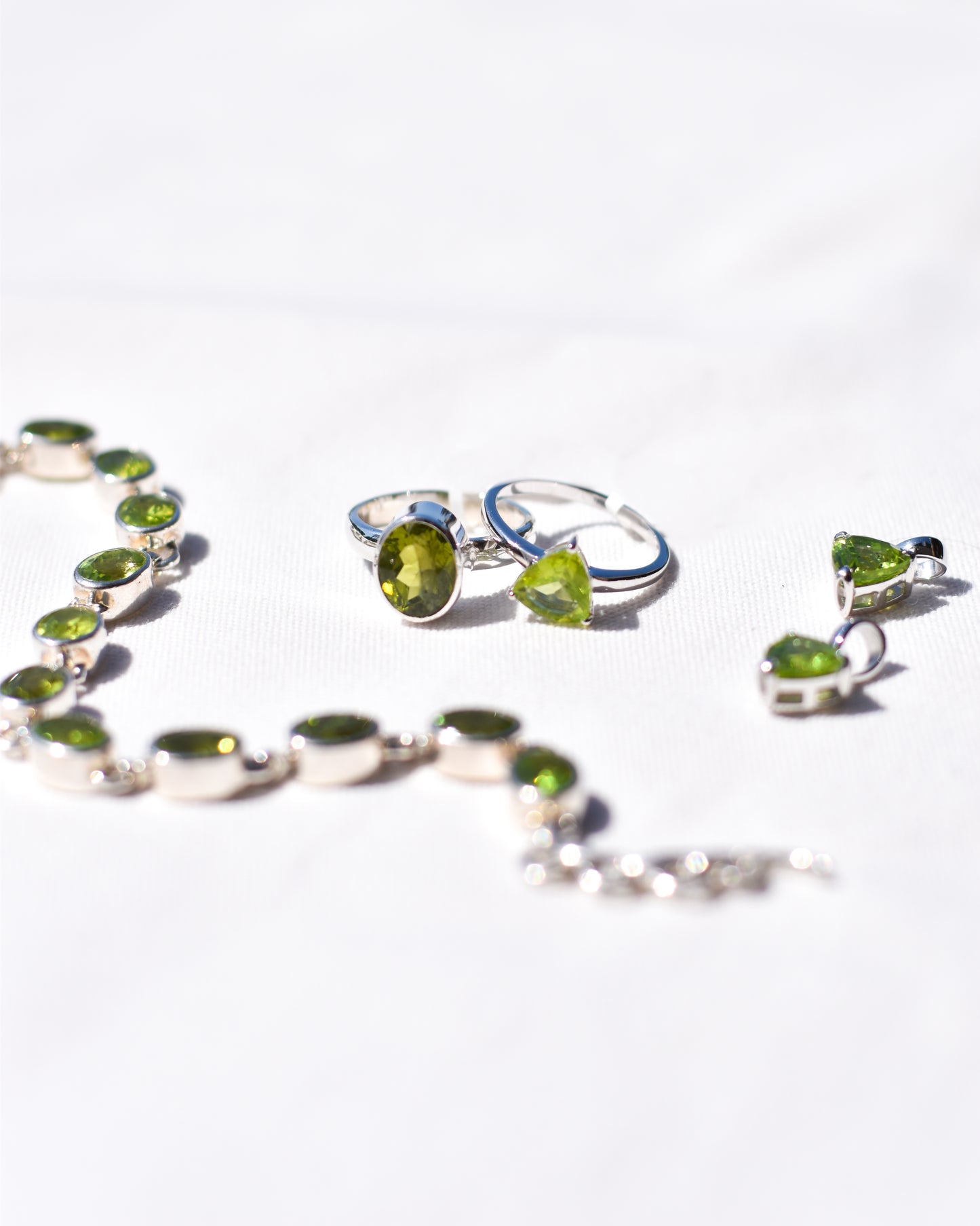 S.S. Faceted Triangle Peridot Necklaces