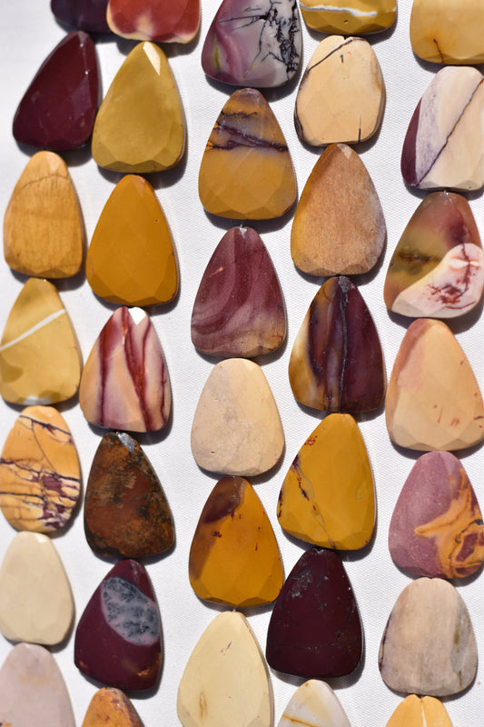 Mookite Faceted Round Triangle Beads
