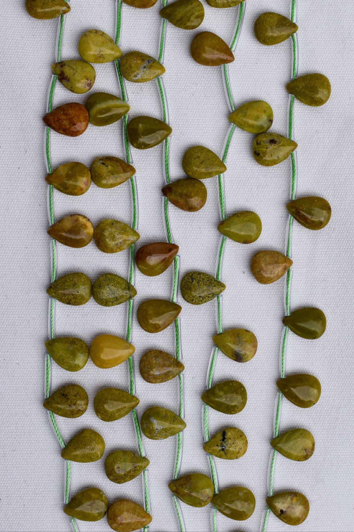 Crafting supplies such as Green Opal Beads available at wholesale and retail prices, only at our crystal shop in San Diego! 