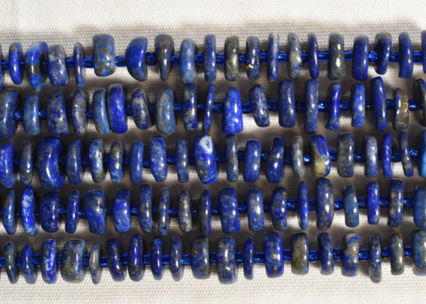 Crafting supplies such as Lapis Lazuli Beads available at wholesale and retail prices, only at our crystal shop in San Diego!