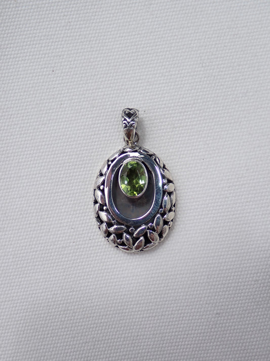 S.S. Faceted Peridot Portal Pendants