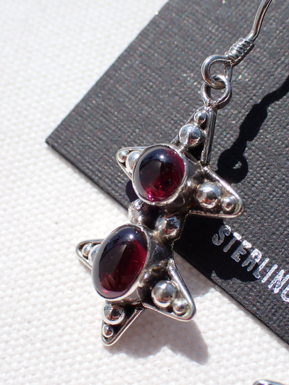 S.S. Garnet Star Drop Earrings