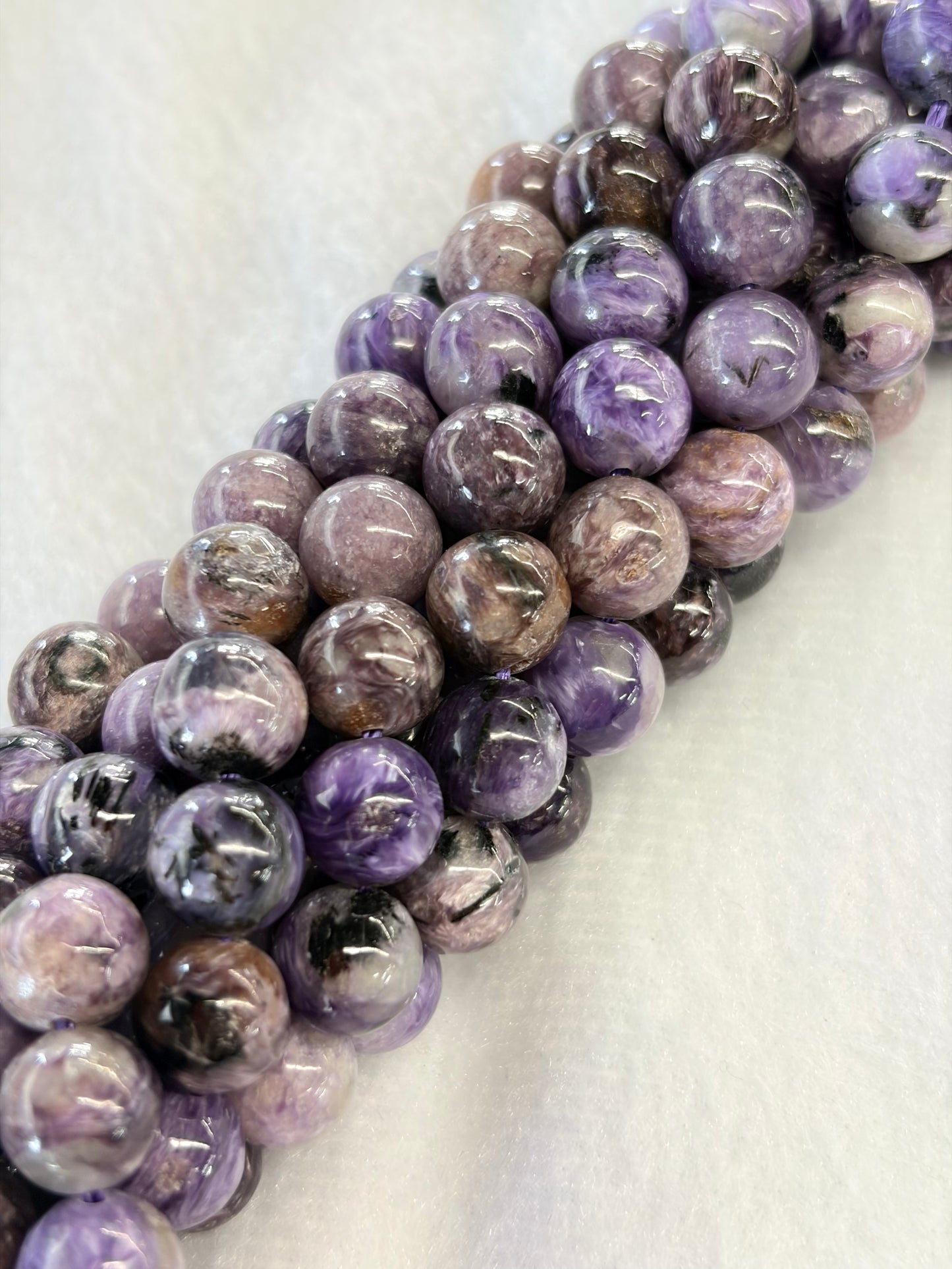 Crafting supplies such as charoite beads available at wholesale and retail prices, only at our crystal shop in San Diego!