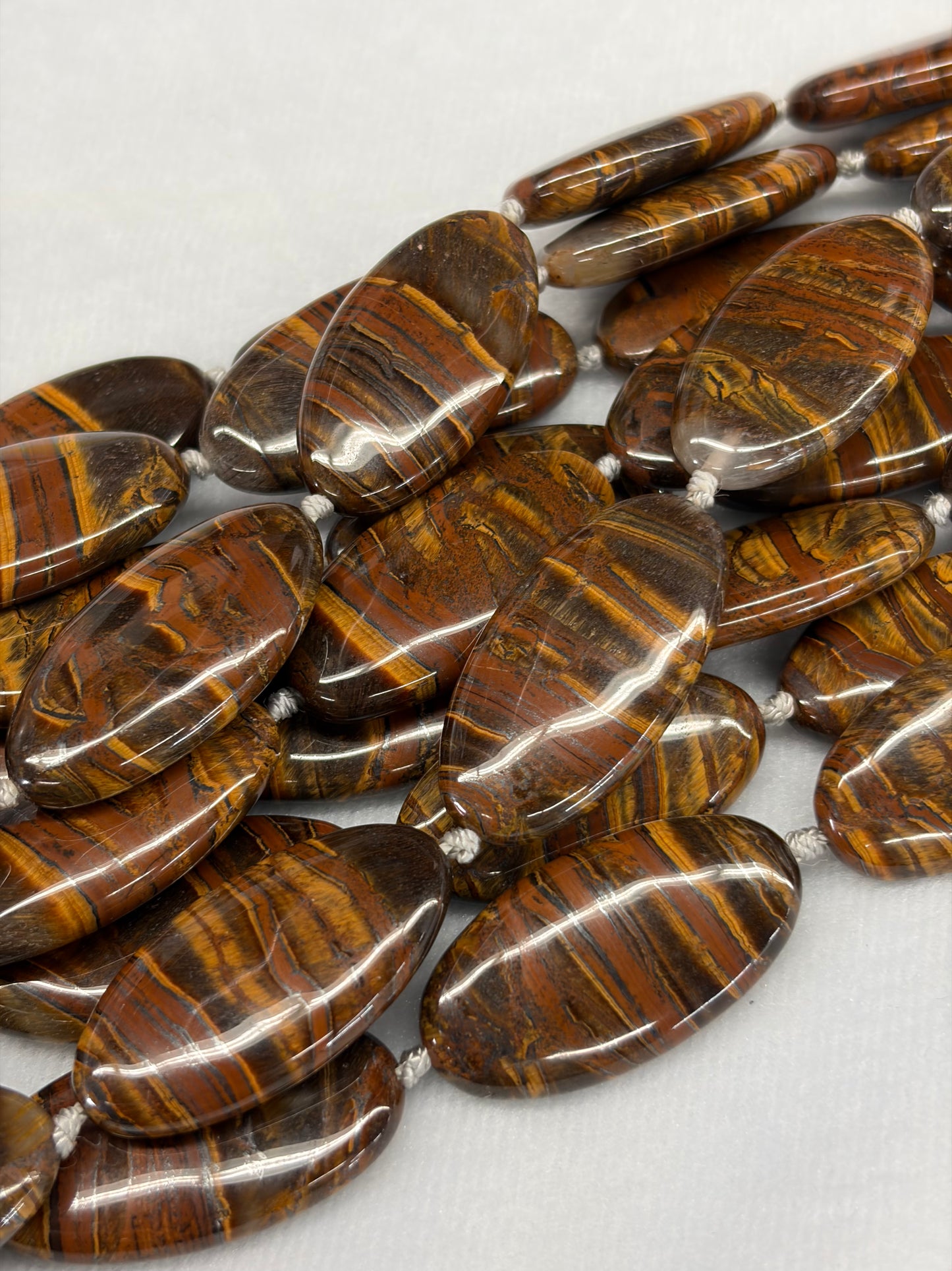 Oval Tiger Iron Beads