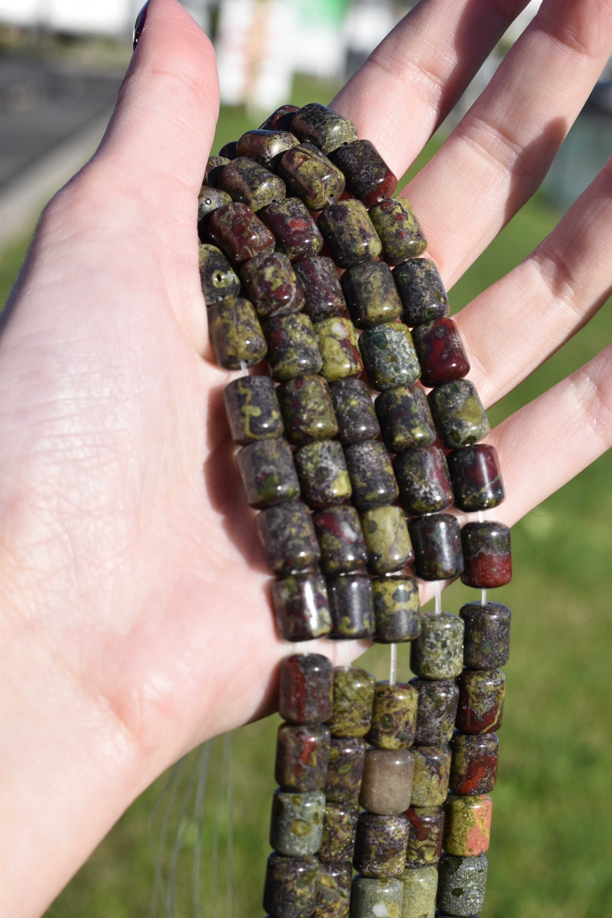 Crafting supplies such as dragon blood jasper tube beads available at wholesale and retail prices, only at our crystal shop in San Diego