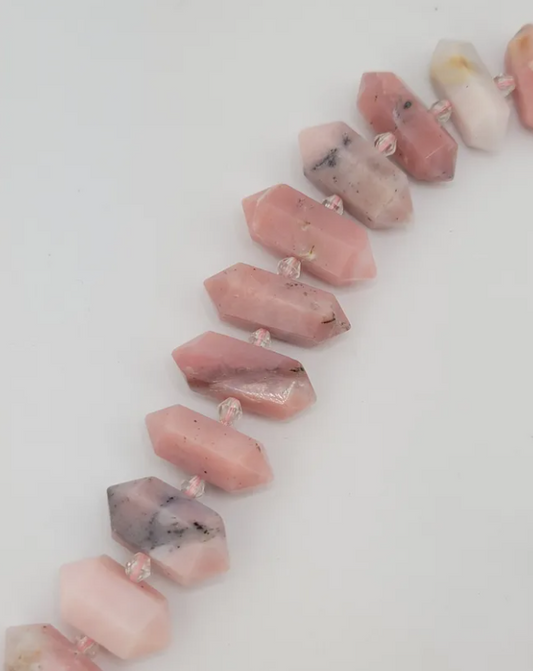 Crafting supplies such as pink opal beads available at wholesale and retail prices, only at our crystal shop in San Diego!