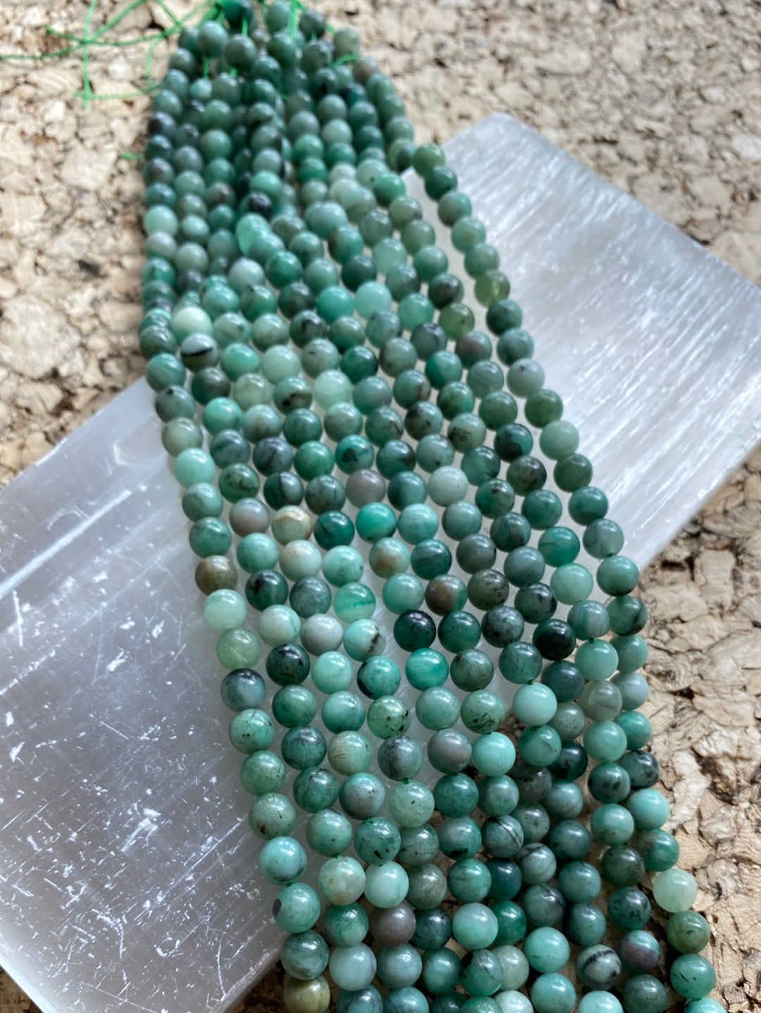 Crafting supplies such as emerald beads available at wholesale and retail prices, only at our crystal shop in San Diego!