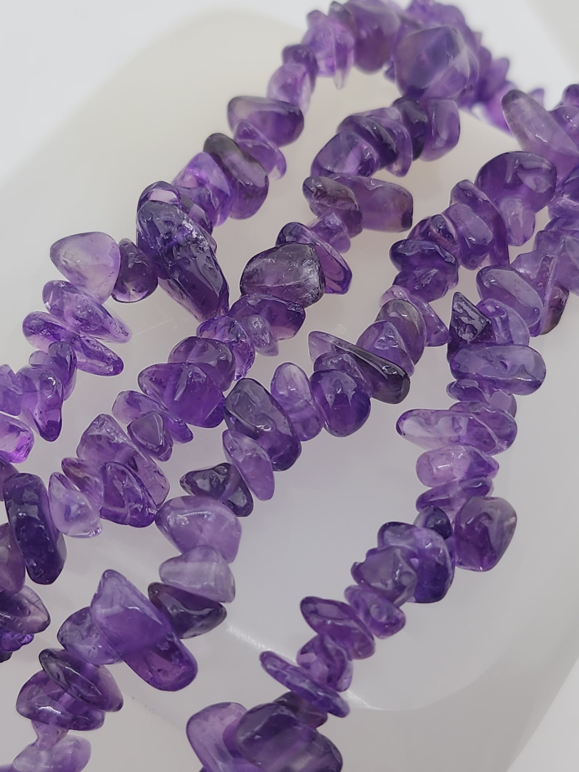 Crafting supplies such as amethyst chip beads available at wholesale and retail prices, only at our crystal shop in San Diego