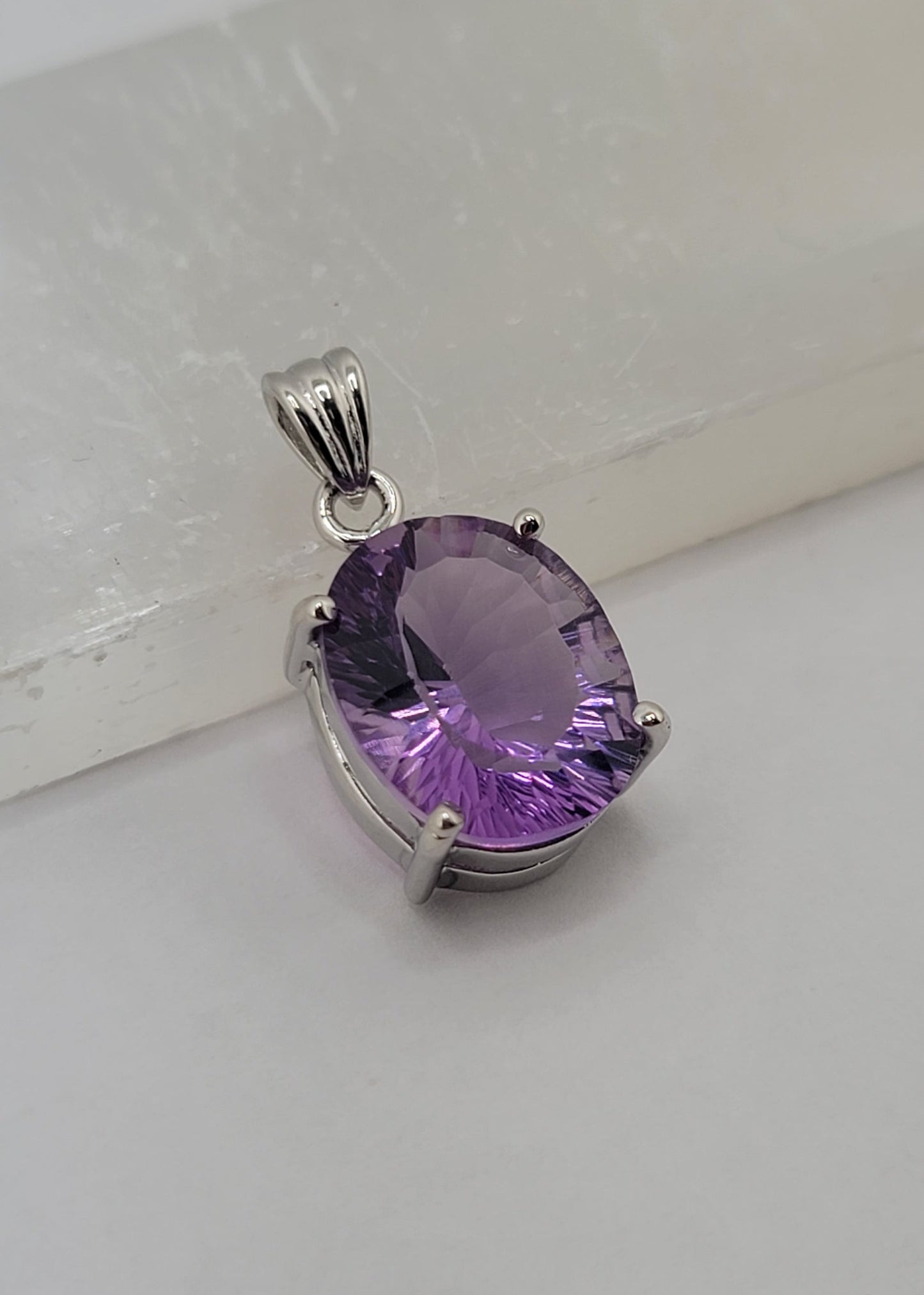 S.S. Faceted lab grown Amethyst Pendants
