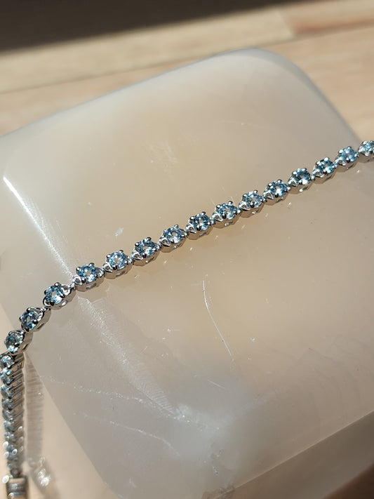 S.S. Faceted Blue Topaz Tennis Bracelet