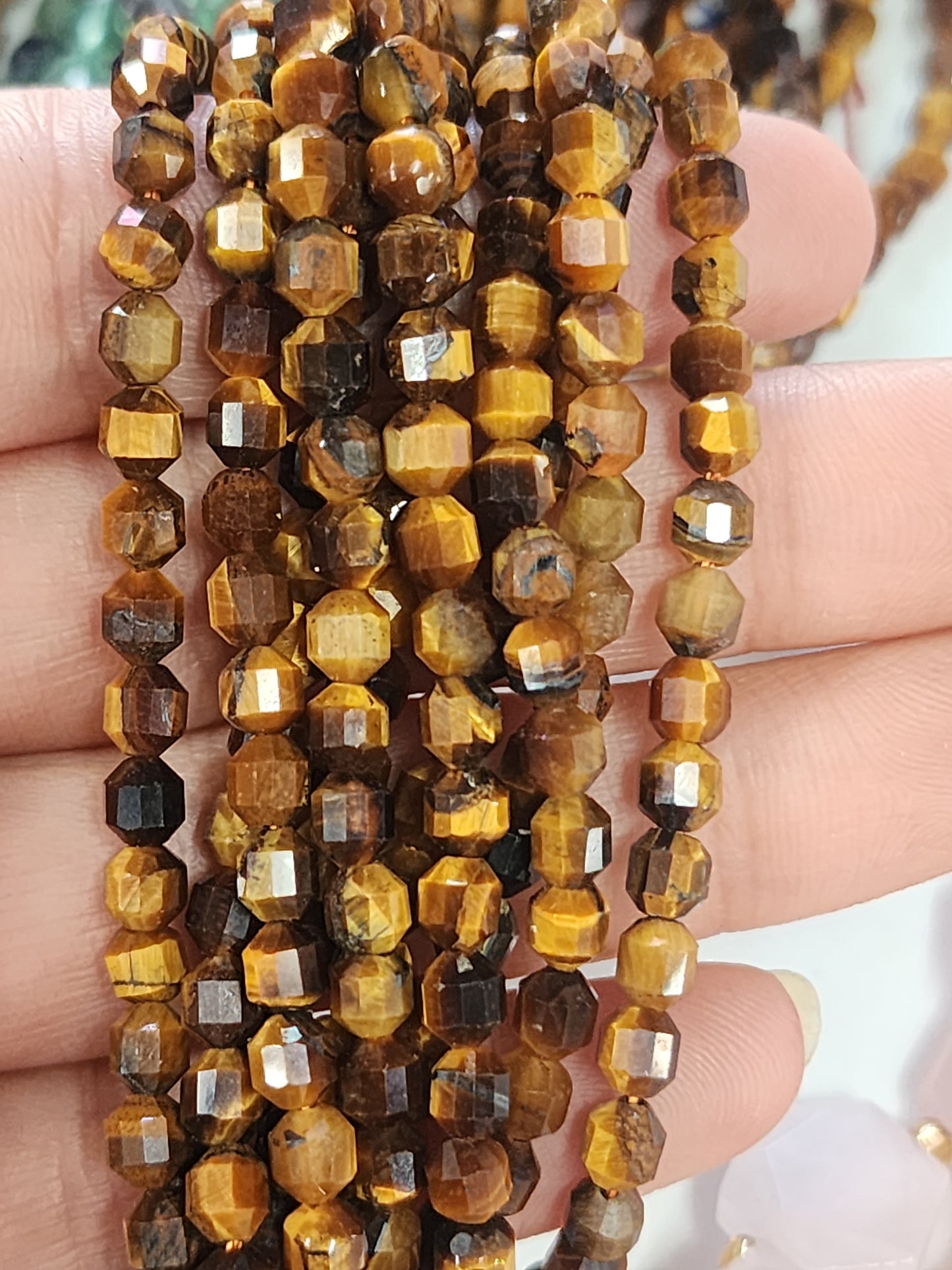 Faceted Tiger Eye Bicone Beads