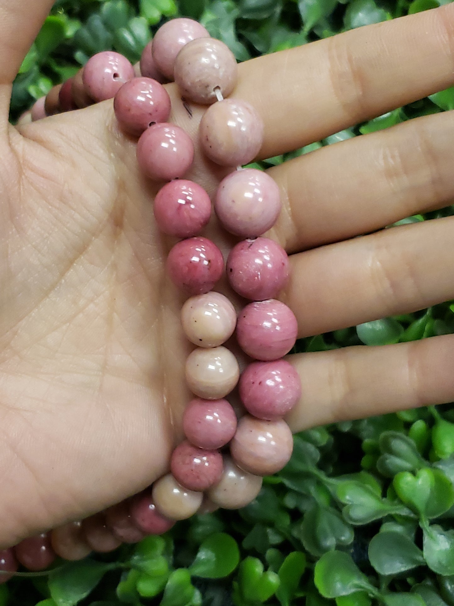 Crafting supplies such as rhodonite beads available at wholesale and retail prices, only at our crystal shop in San Diego!