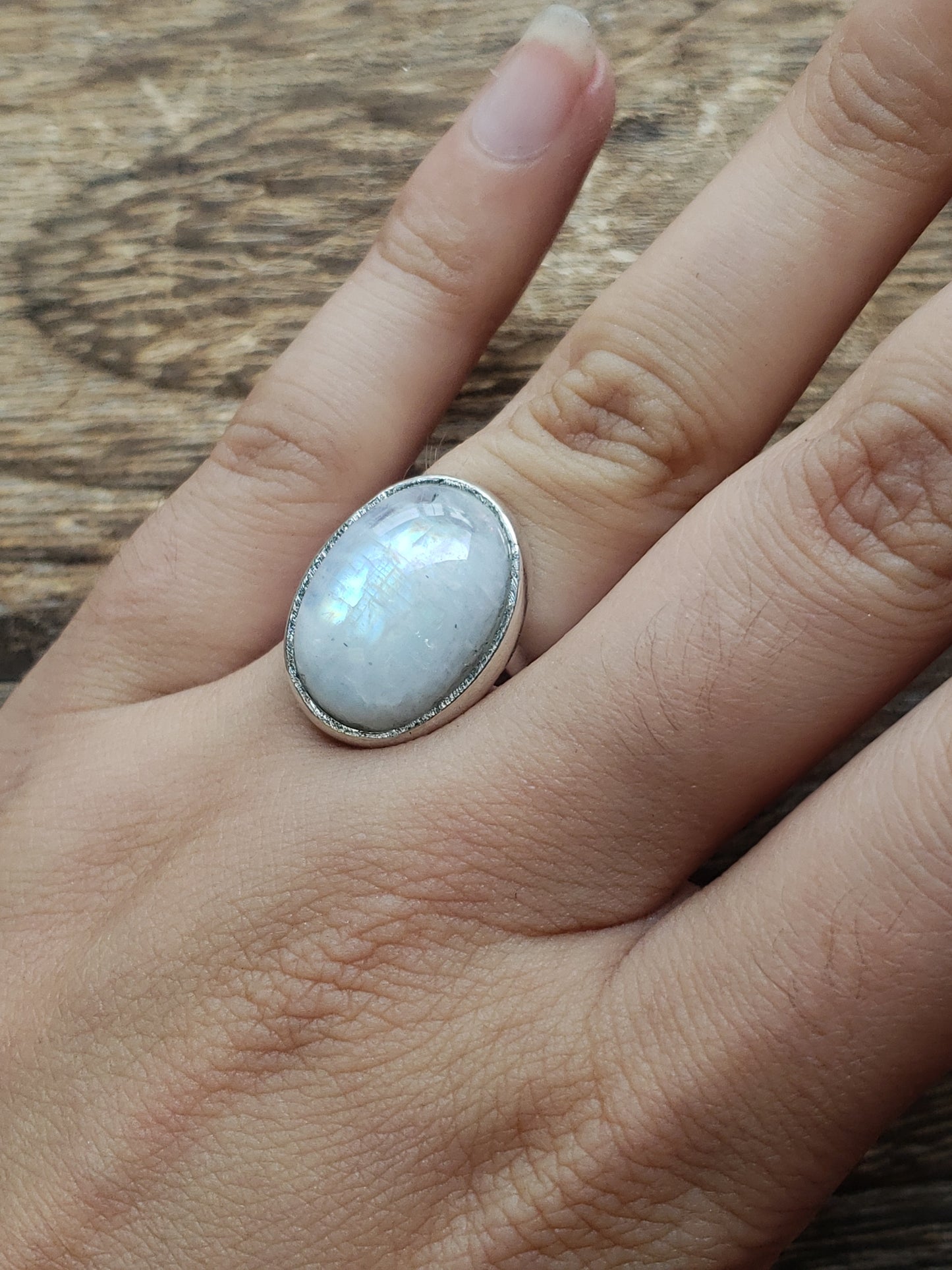 Sterling silver rainbow moonstone ring available at wholesale and retail prices, only at our crystal shop in San Diego!