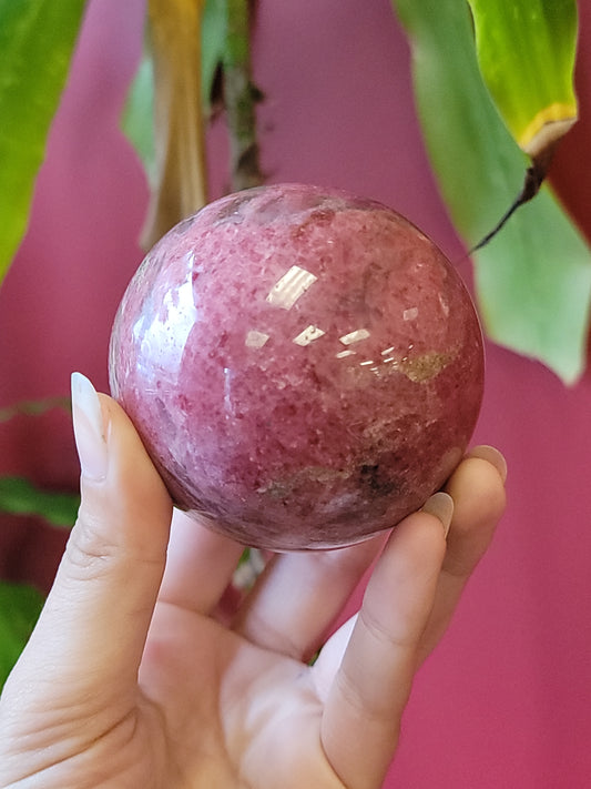 Rhodonite spheres available at wholesale and retail prices, only at our crystal shop in San Diego!