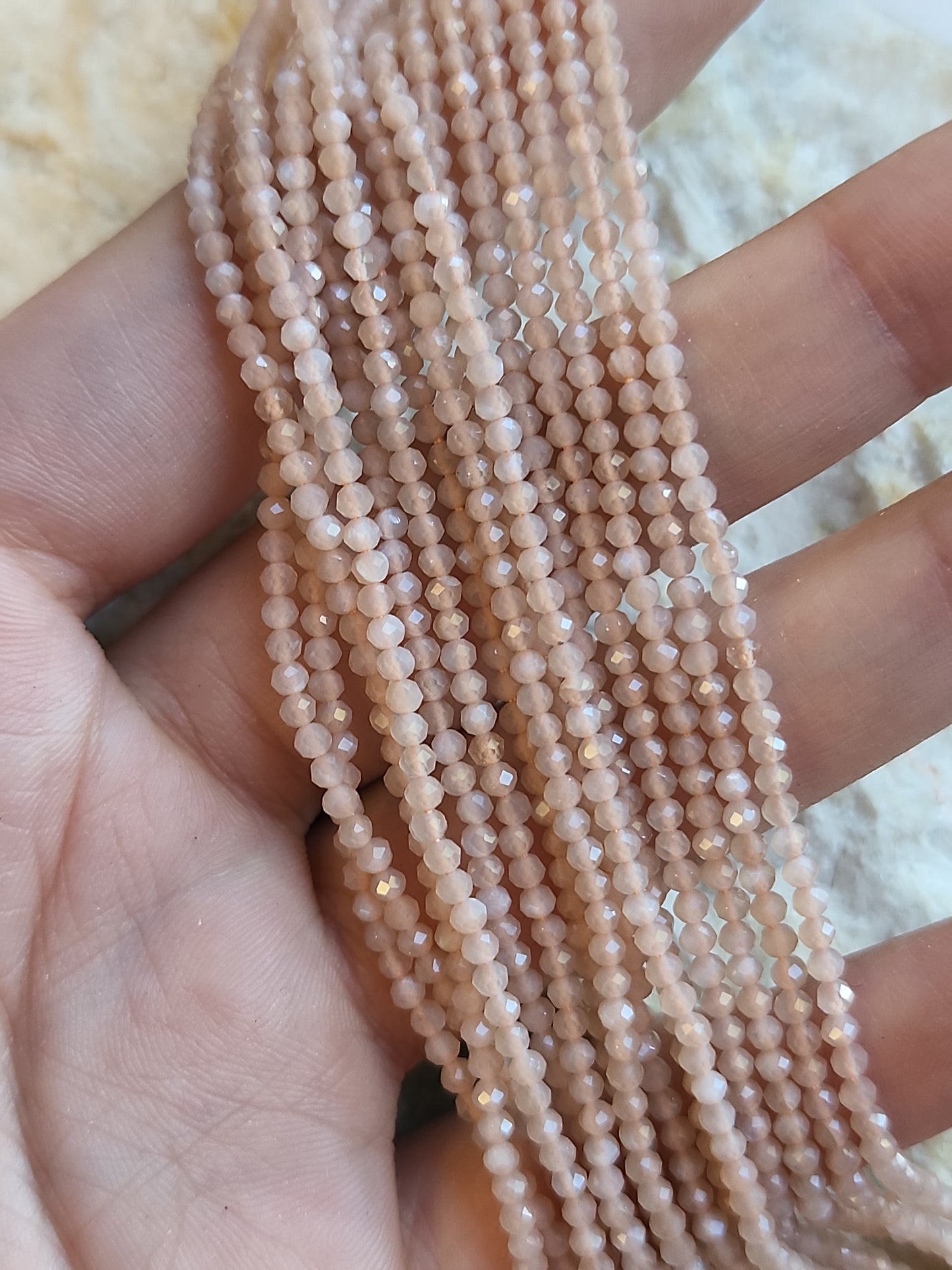 Crafting supplies such as faceted sunstone beads available at wholesale and retail prices, only at our crystal shop in San Diego!