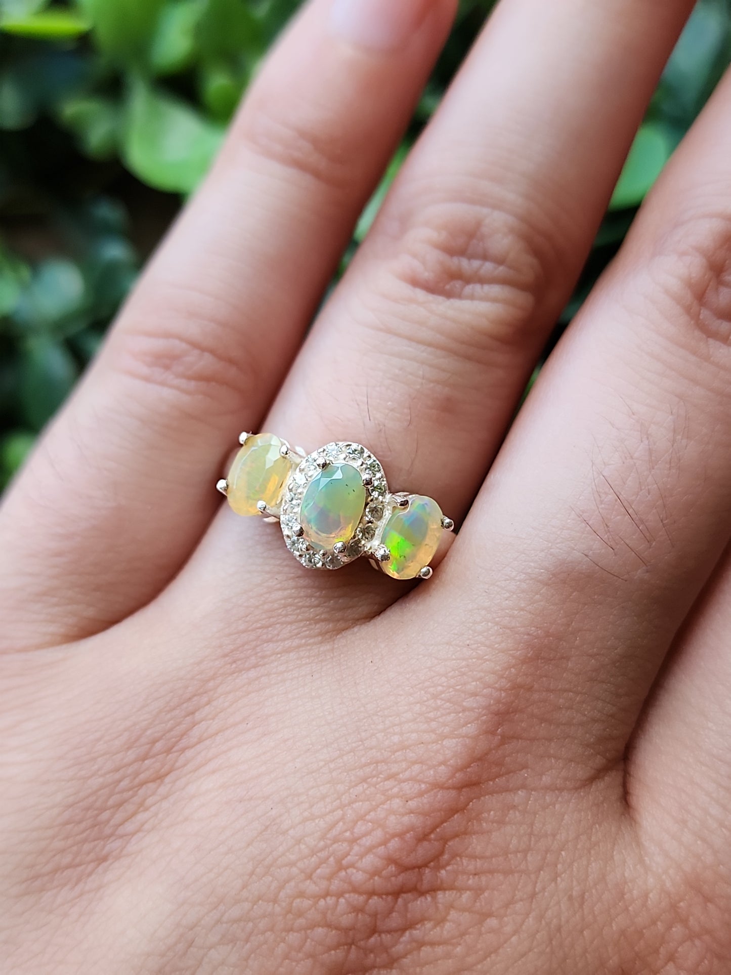 S.S. Faceted Ethiopian Opal and Zircon Tri-stone Rings