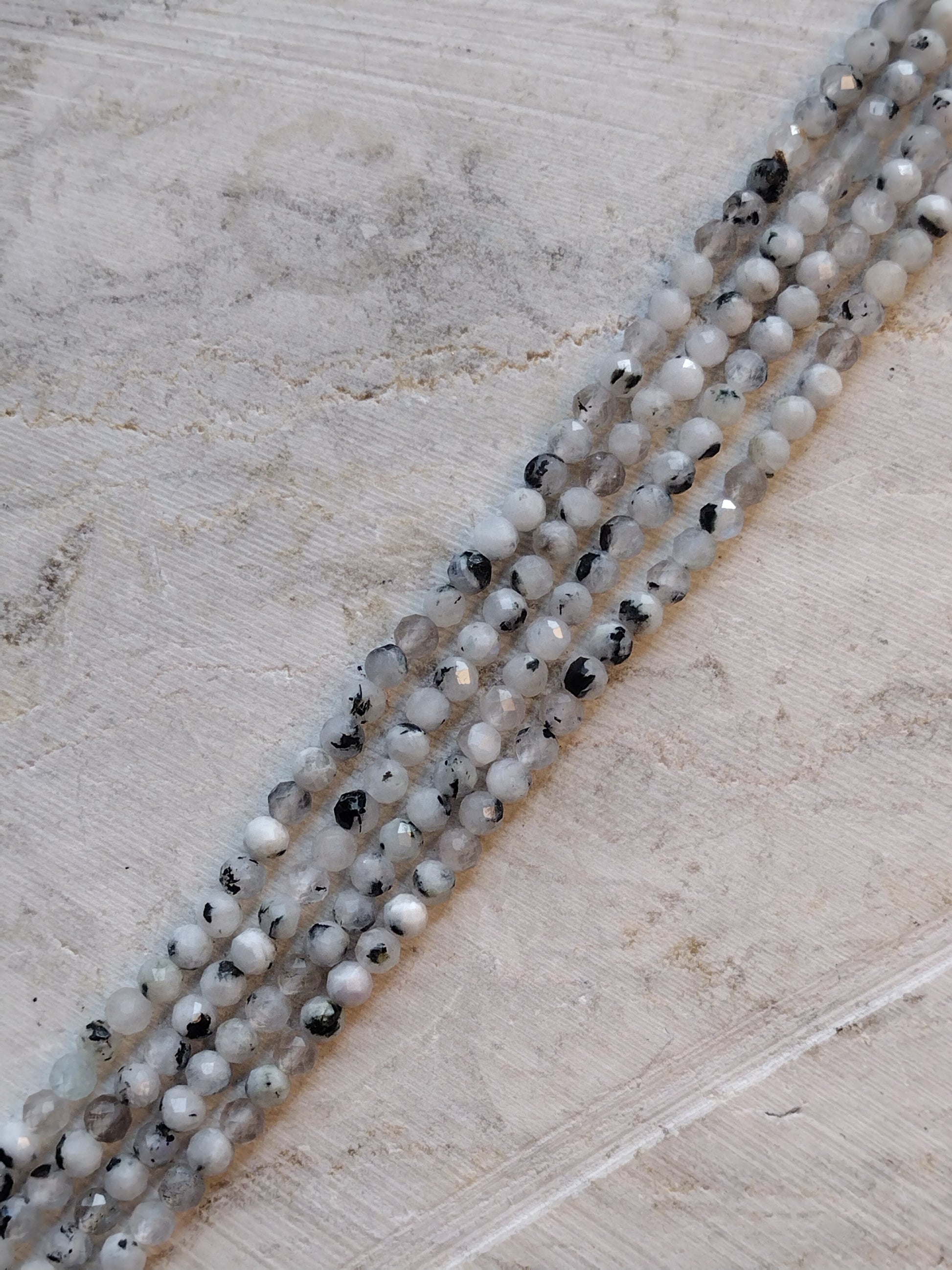 Crafting supplies such as moonstone beads available at wholesale and retail prices, only at our crystal shop in San Diego!