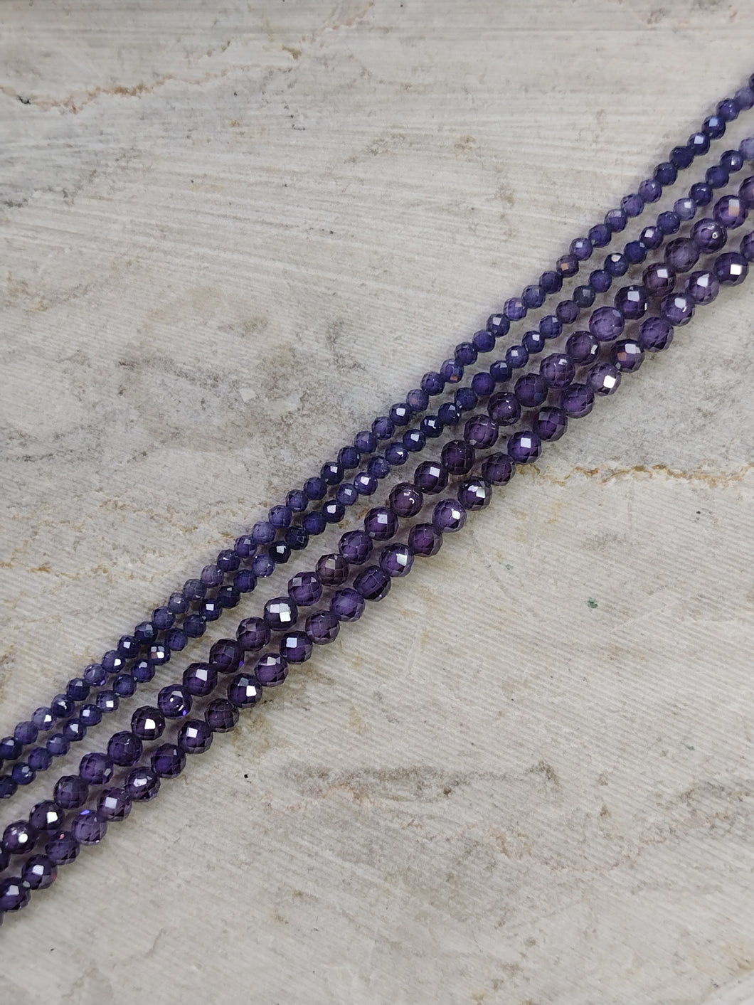 Faceted Purple Zircon Beads