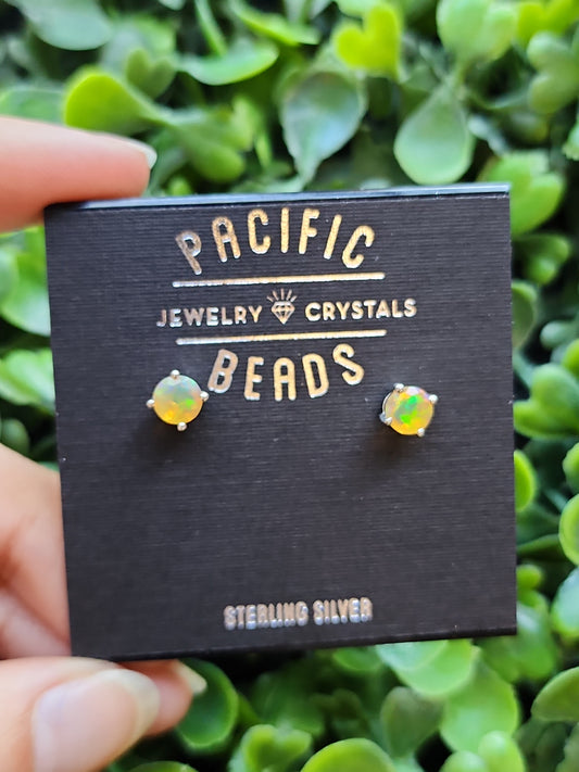 Sterling silver opal stud earrings available at wholesale and retail prices, only at our crystal shop in San Diego!