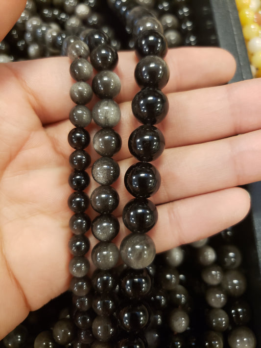 Crafting supplies such as silver sheen obsidian beads available at wholesale and retail prices, only at our crystal shop in San Diego!