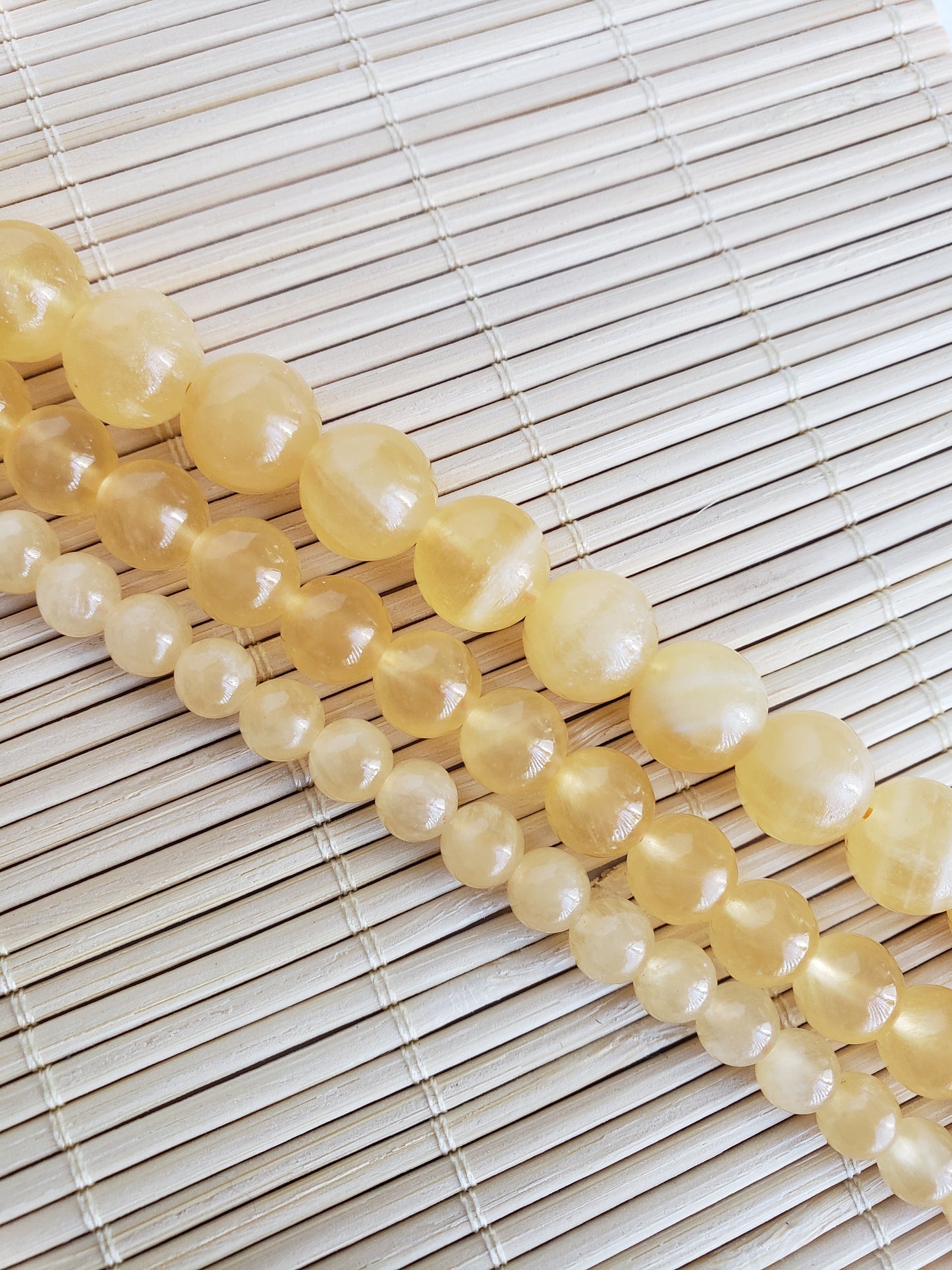 Crafting supplies such as yellow calcite beads available at wholesale and retail prices, only at our crystal shop in San Diego!