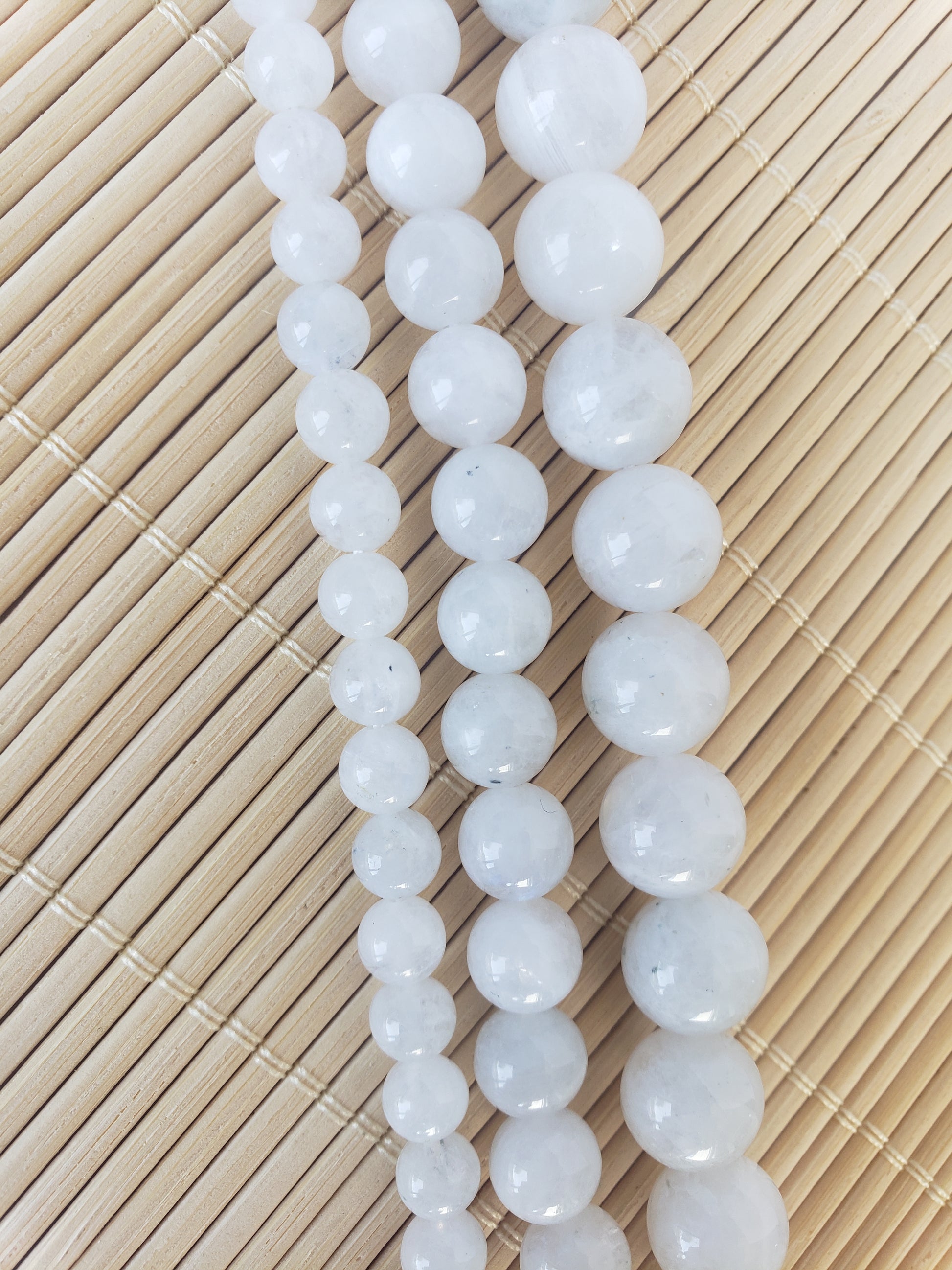 Crafting supplies such as rainbow moonstone beads available at wholesale and retail prices, only at our crystal shop in San Diego!