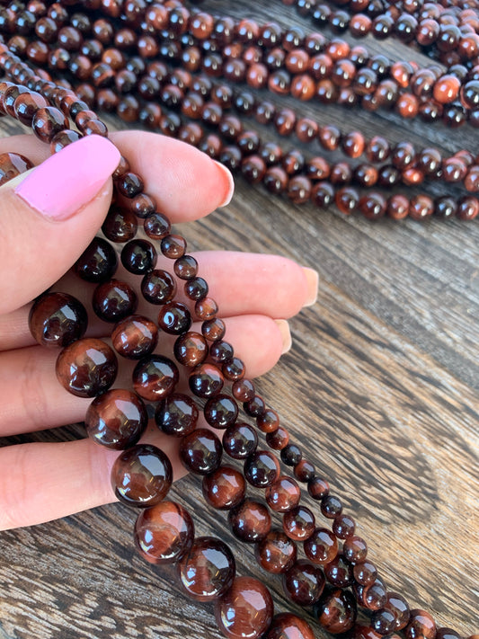 Crafting supplies such as red tiger eye beads available at wholesale and retail prices, only at our crystal shop in San Diego!