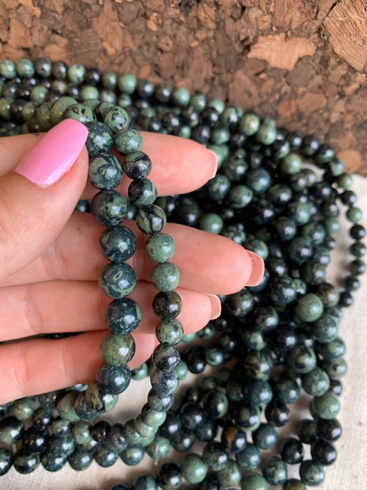Crafting supplies such as kambaba jasper beads available at wholesale and retail prices, only at our crystal shop in San Diego!